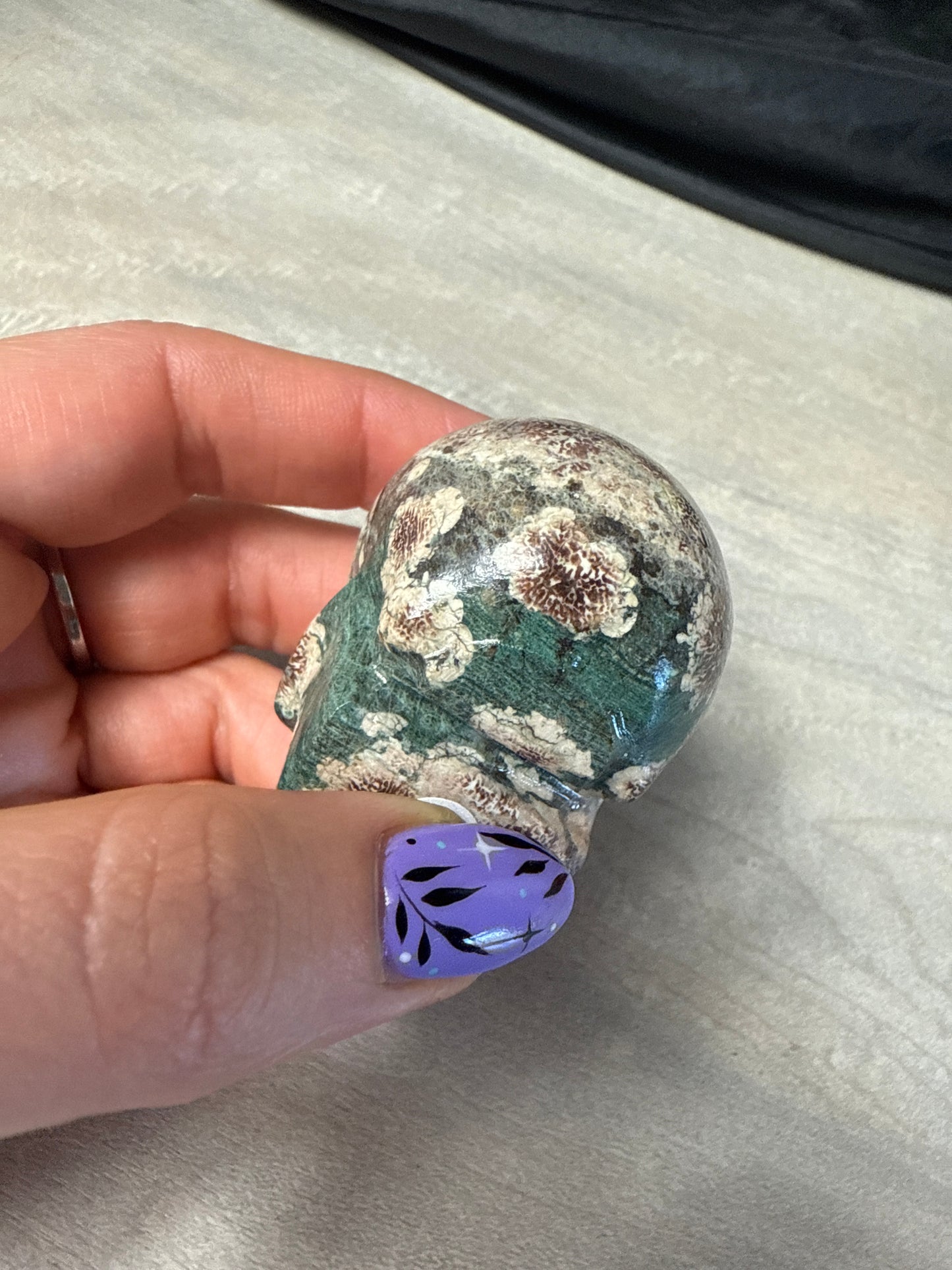 Rhyolite flower in African green jasper Skull