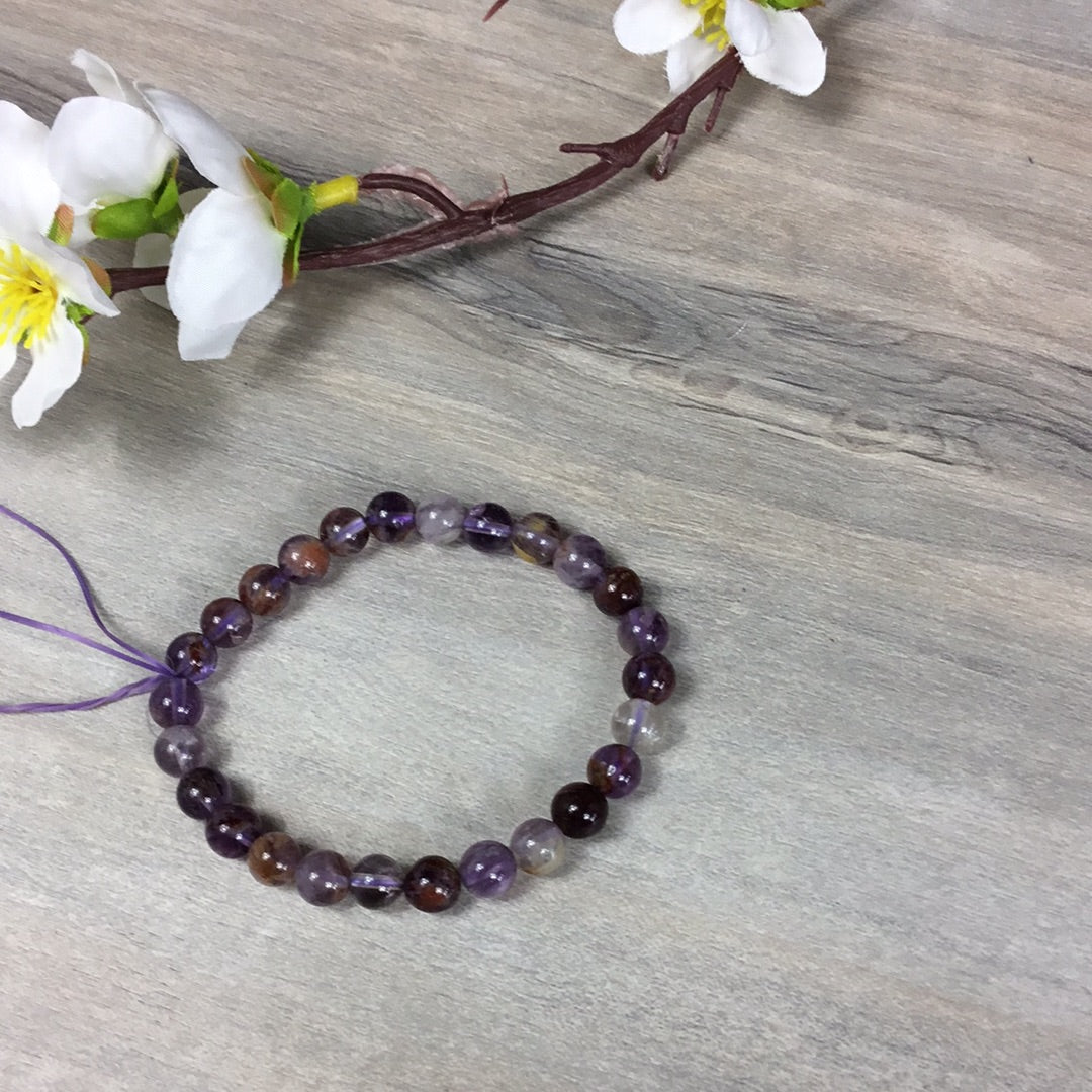 Amethyst with inclusions -7mm Bead Bracelet