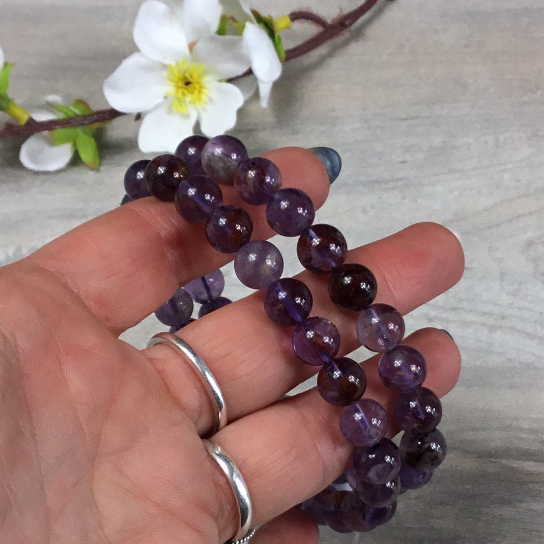 Amethyst with inclusions - 8mm Bead Bracelet