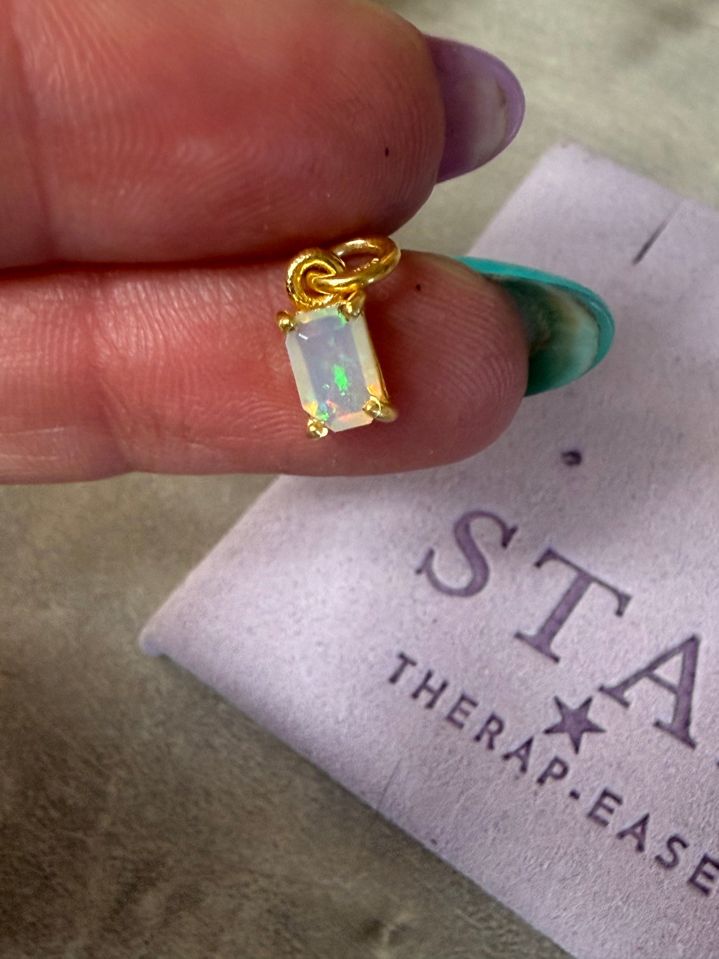 Emerald cut 18K Gold Pendant